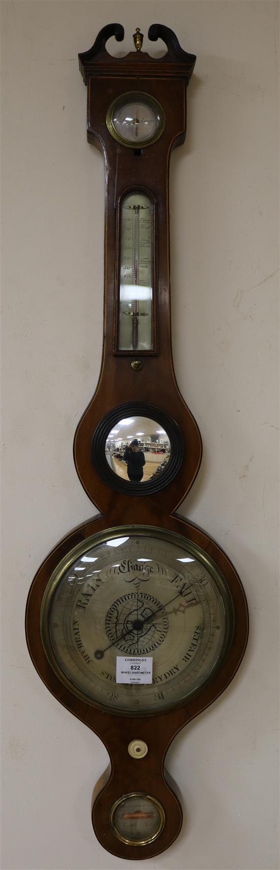 A Regency mahogany wheel barometer, by Mangiacavalli of Leather Lane, H.3ft 2in.